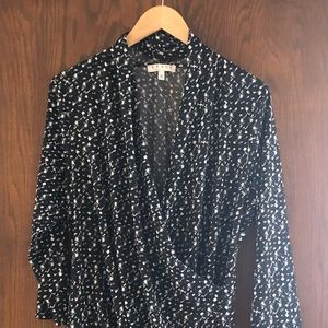 Chaus faux wrap with 3/4 length sleeve.